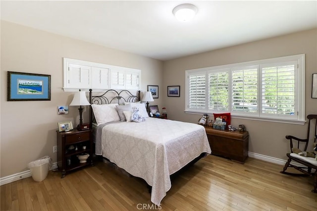 161 W Loretto Ct, Claremont, CA 91711 - bedroom with light wood-type flooring and baseboards