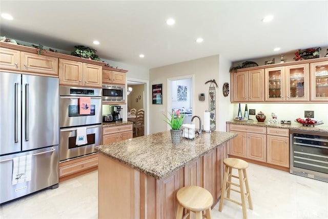 161 W Loretto Ct, Claremont, CA 91711 - kitchen featuring stainless steel appliances, beverage cooler, recessed lighting, light stone countertops, and light brown cabinets
