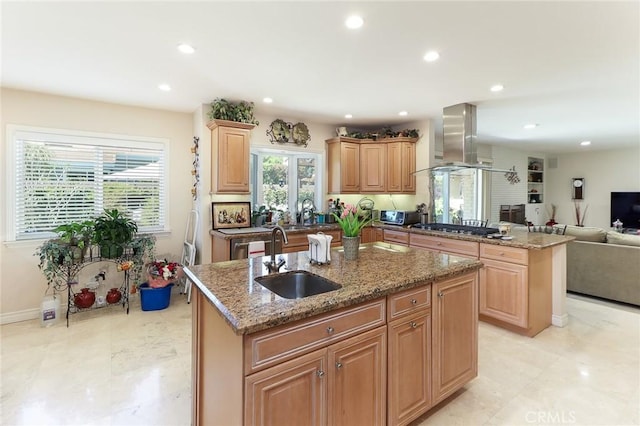 161 W Loretto Ct, Claremont, CA 91711 - kitchen with wall chimney exhaust hood, a sink, a center island with sink, recessed lighting, and light stone counters