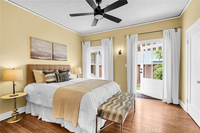 4775 Somerset Dr, Riverside, CA 92507 - bedroom with access to exterior, wood finished floors, baseboards, ceiling fan, and ornamental molding