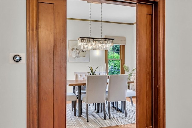 4775 Somerset Dr, Riverside, CA 92507 - dining room with a chandelier and crown molding