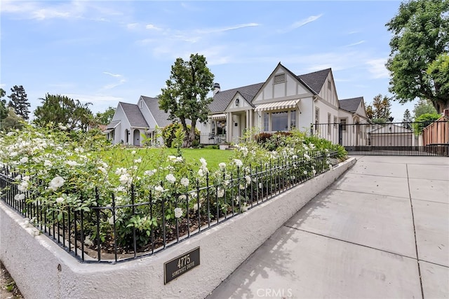 4775 Somerset Dr, Riverside, CA 92507 - view of home's exterior featuring fence and a gate