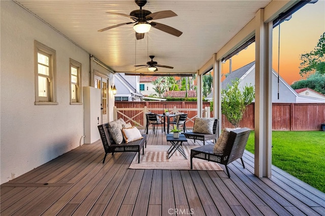 4775 Somerset Dr, Riverside, CA 92507 - deck at dusk featuring ceiling fan, outdoor dining area, and an outdoor living space