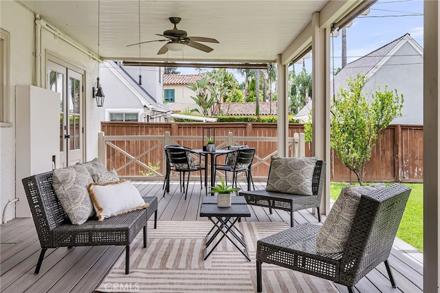 4775 Somerset Dr, Riverside, CA 92507 - deck with fence, ceiling fan, outdoor dining area, and french doors
