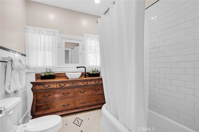 4775 Somerset Dr, Riverside, CA 92507 - full bathroom featuring toilet, shower / tub combo with curtain, vanity, and tile patterned floors