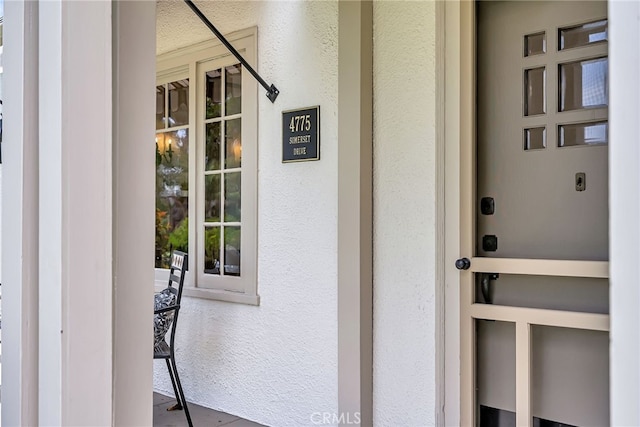 4775 Somerset Dr, Riverside, CA 92507 - doorway to property with stucco siding