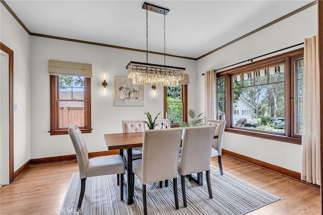 4775 Somerset Dr, Riverside, CA 92507 - dining space with baseboards, crown molding, light wood-style flooring, and a chandelier