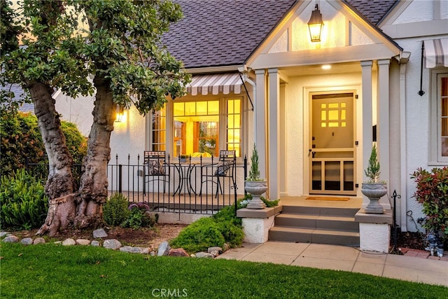 4775 Somerset Dr, Riverside, CA 92507 - doorway to property featuring a shingled roof and stucco siding