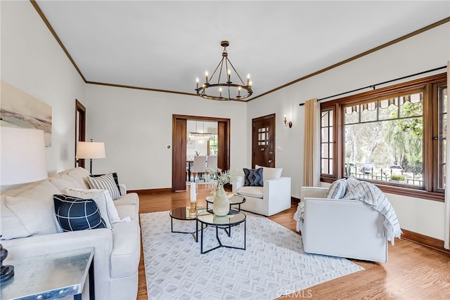 4775 Somerset Dr, Riverside, CA 92507 - living area with a chandelier, crown molding, baseboards, and light wood-style floors