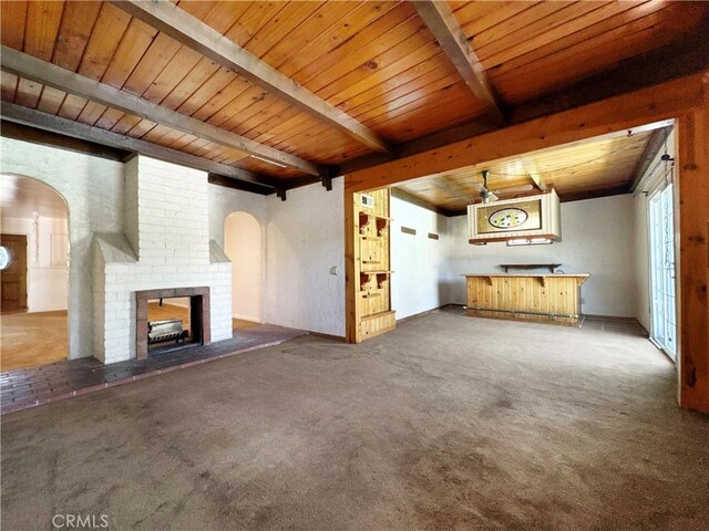 817 W Heber St, Glendora, CA 91741 - unfurnished living room with arched walkways, beam ceiling, wooden ceiling, carpet, and a fireplace