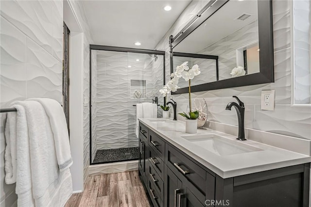 803 Spencer St, Redondo Beach, CA 90277 - full bathroom with recessed lighting, a shower stall, double vanity, and wood finished floors