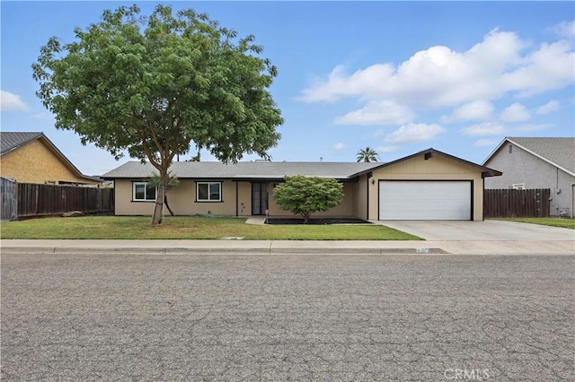 ranch-style home with a garage and concrete driveway
