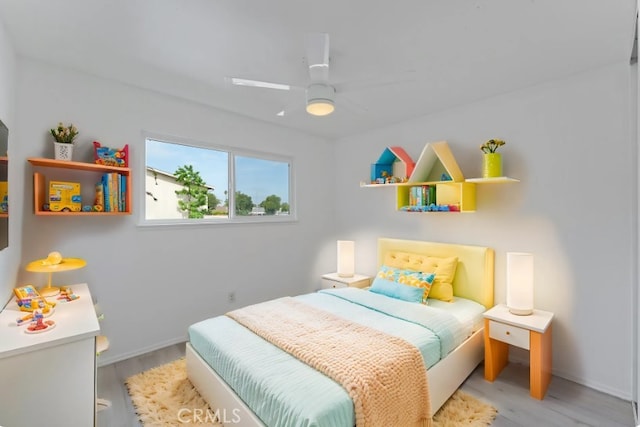 1317 Via Santiago Unit C, Corona, CA 92882 - bedroom featuring light wood-style floors, baseboards, and ceiling fan