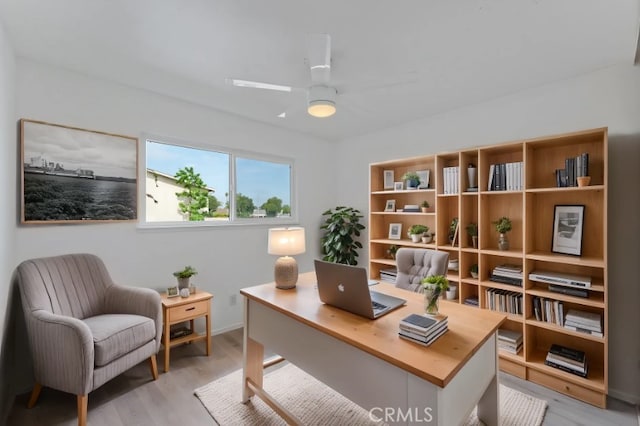 1317 Via Santiago Unit C, Corona, CA 92882 - office area with light wood-style flooring, ceiling fan, and baseboards