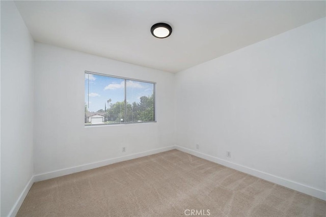 3180 Little Mountain Dr Unit D, San Bernardino, CA 92405 - carpeted empty room with baseboards
