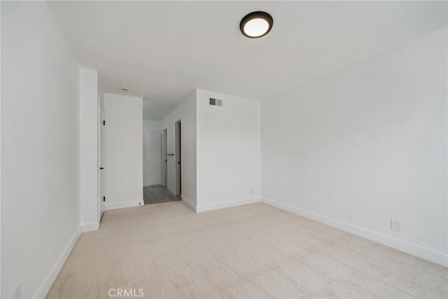 3180 Little Mountain Dr Unit D, San Bernardino, CA 92405 - spare room featuring light carpet and baseboards