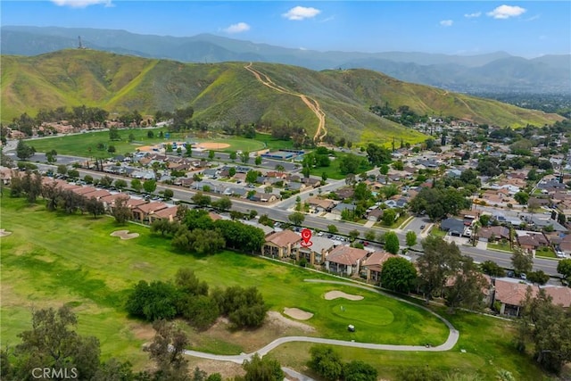 3180 Little Mountain Dr Unit D, San Bernardino, CA 92405 - aerial view of property and surrounding area with mountains, nearby suburban area, and a local golf course