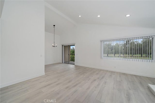 3180 Little Mountain Dr Unit D, San Bernardino, CA 92405 - empty room featuring a chandelier, light wood-type flooring, baseboards, recessed lighting, and high vaulted ceiling