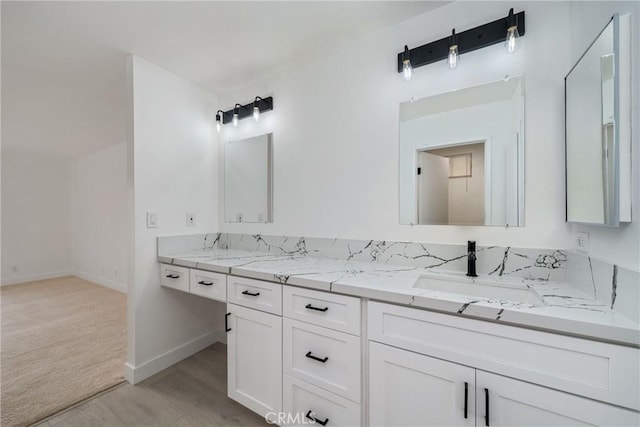 3180 Little Mountain Dr Unit D, San Bernardino, CA 92405 - full bath featuring double vanity, baseboards, and wood finished floors