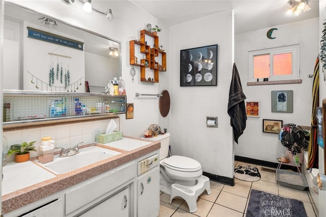 1825 Magnolia Ave, Chico, CA 95926 - bathroom with vanity, tile patterned flooring, and tasteful backsplash