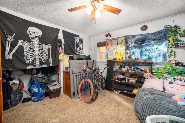 1825 Magnolia Ave, Chico, CA 95926 - bedroom featuring a textured ceiling, carpet floors, and a ceiling fan