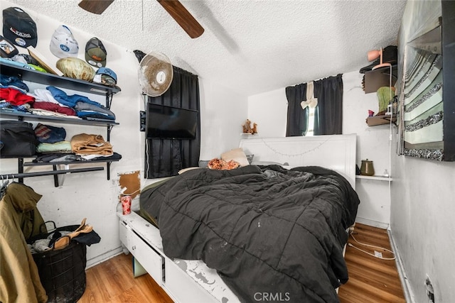 1825 Magnolia Ave, Chico, CA 95926 - bedroom with wood finished floors, a textured ceiling, and ceiling fan