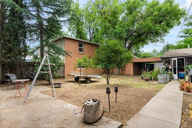 1825 Magnolia Ave, Chico, CA 95926 - view of yard with a patio and an outbuilding