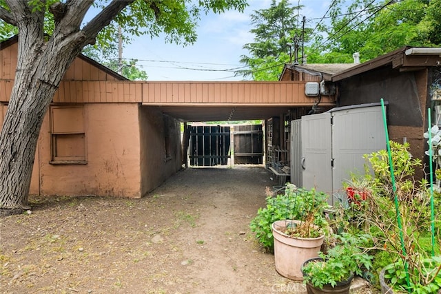 1825 Magnolia Ave, Chico, CA 95926 - view of outdoor structure with an attached carport