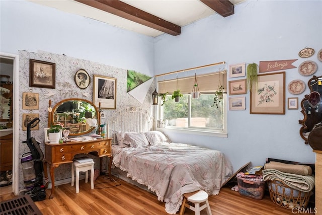 1825 Magnolia Ave, Chico, CA 95926 - bedroom with wood finished floors, beamed ceiling, and wallpapered walls