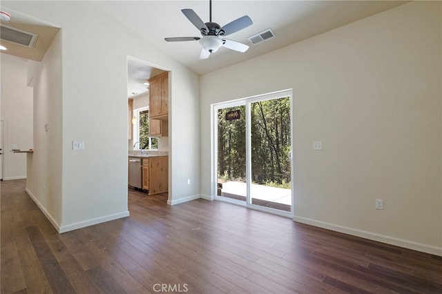 4901 Papaya Rd, Forest Ranch, CA 95942 - unfurnished living room featuring dark wood-style flooring, ceiling fan, baseboards, and lofted ceiling