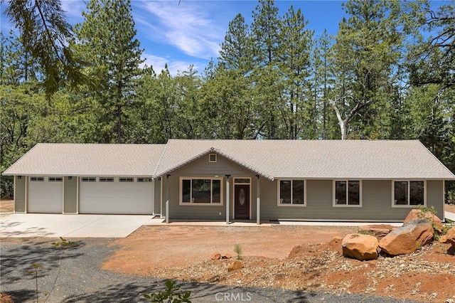 4901 Papaya Rd, Forest Ranch, CA 95942 - ranch-style house featuring a garage and driveway