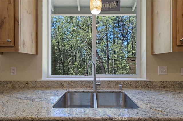 4901 Papaya Rd, Forest Ranch, CA 95942 - kitchen with a sink, healthy amount of natural light, and light stone counters