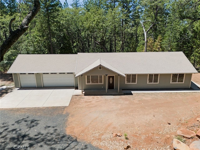 4901 Papaya Rd, Forest Ranch, CA 95942 - ranch-style home featuring concrete driveway and a garage