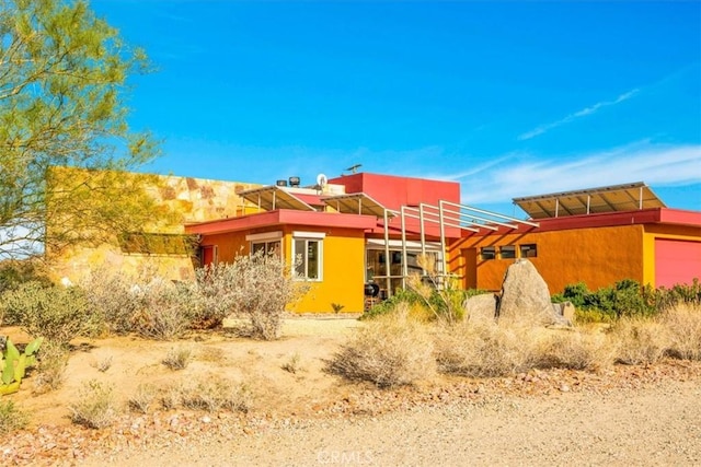 7078 Sunkist Rd, Joshua Tree, CA 92252 - view of home's exterior with a garage