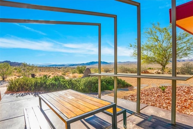 exterior space featuring a mountain view
