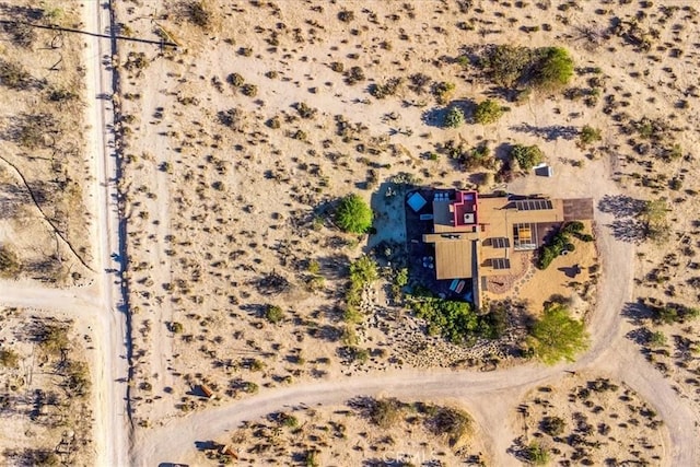 aerial view of sparsely populated area with a desert landscape