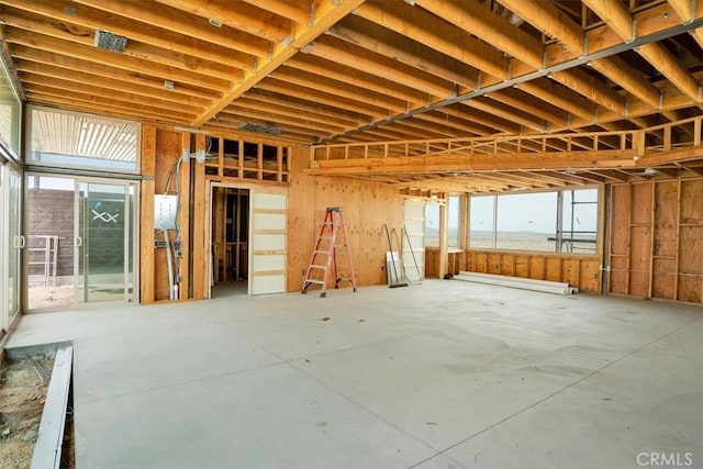 misc room with concrete flooring