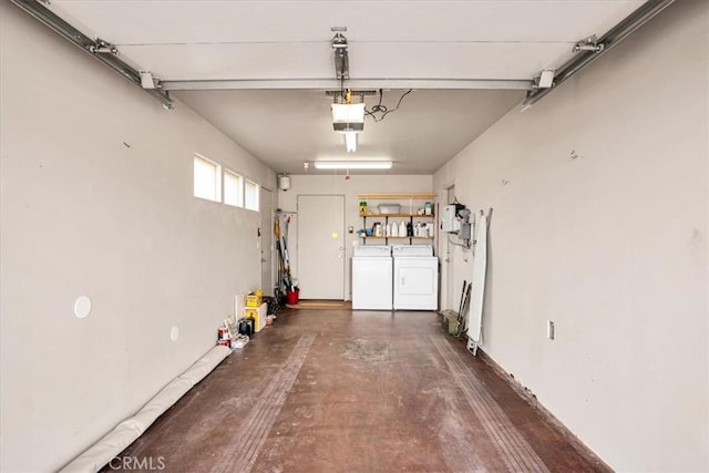 7078 Sunkist Rd, Joshua Tree, CA 92252 - garage featuring washing machine and dryer and a garage door opener