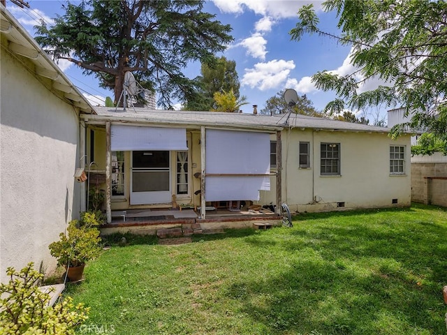 137 N Rose St, Burbank, CA 91505 - rear view of house with crawl space and stucco siding
