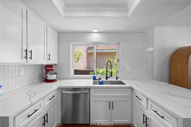 15 Vittoria St, Laguna Niguel, CA 92677 - kitchen featuring dishwasher, a tray ceiling, a sink, crown molding, and white cabinets