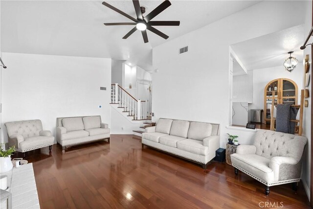 15 Vittoria St, Laguna Niguel, CA 92677 - living room featuring a ceiling fan, wood finished floors, stairs, lofted ceiling, and arched walkways