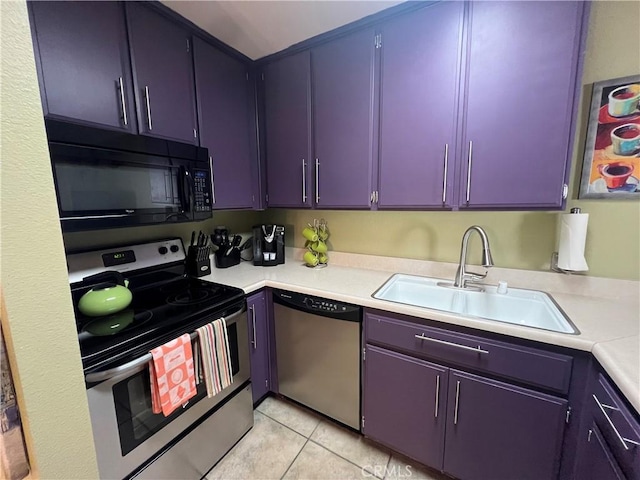 470 S Calle Encilia Unit B11, Palm Springs, CA 92262 - kitchen featuring stainless steel appliances, a sink, light countertops, and light tile patterned floors