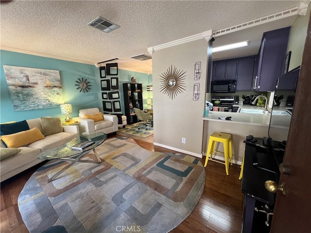 470 S Calle Encilia Unit B11, Palm Springs, CA 92262 - living room with ornamental molding, a textured ceiling, and wood-type flooring