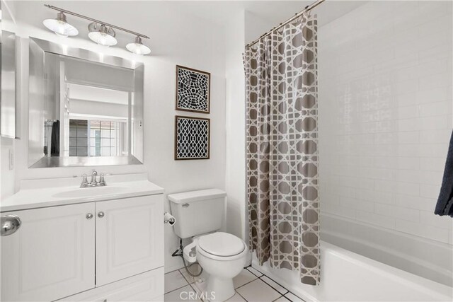 23622 Wakefield Ct Unit 69, Laguna Niguel, CA 92677 - full bathroom featuring toilet, tile patterned flooring, shower / bath combination with curtain, and vanity