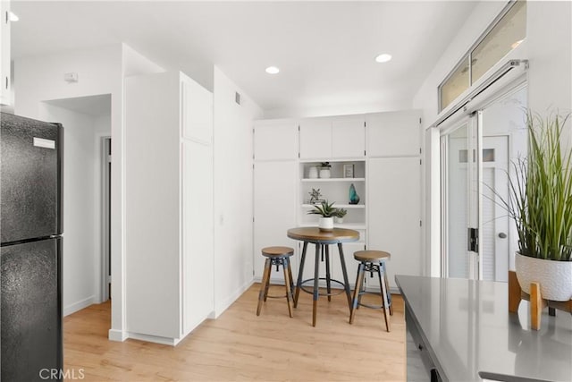 23622 Wakefield Ct Unit 69, Laguna Niguel, CA 92677 - dining space featuring light wood-type flooring and recessed lighting