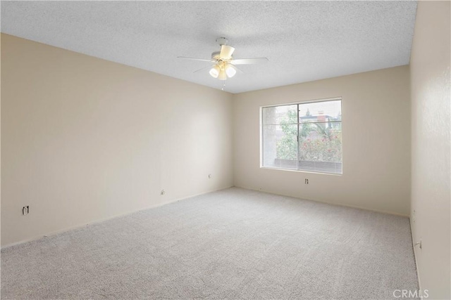 845 Daffodil Dr, Riverside, CA 92507 - unfurnished room with carpet, a ceiling fan, and a textured ceiling
