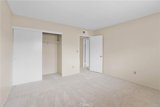 845 Daffodil Dr, Riverside, CA 92507 - unfurnished bedroom with light colored carpet and a closet