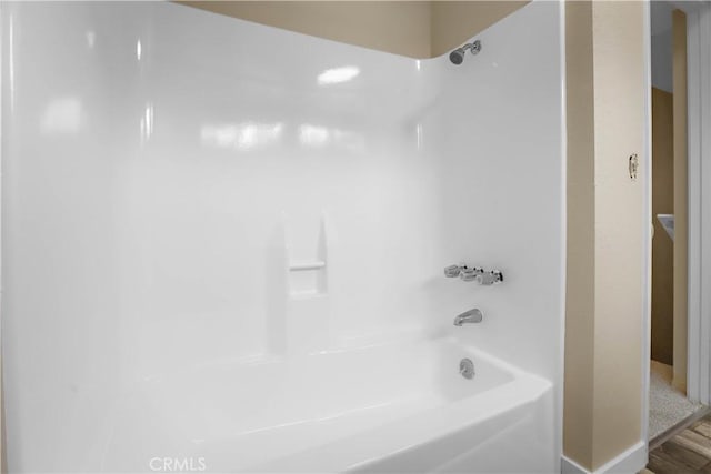 845 Daffodil Dr, Riverside, CA 92507 - full bath with washtub / shower combination and wood finished floors