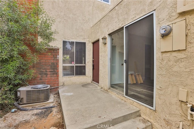 845 Daffodil Dr, Riverside, CA 92507 - entrance to property featuring cooling unit and stucco siding