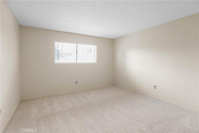 845 Daffodil Dr, Riverside, CA 92507 - carpeted spare room with a textured ceiling